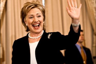 afp : US Secretary of State Hillary Clinton waves as she arrives at a ceremonial swearing-in at the State Department in Washington on February 2, 2009. AFP