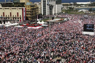 Tens of thousands opposition supporters rally in down town Beirut's Martyr Square marking the sixth anniversary of a popular uprising against Syrian troops in Lebanon, which resulted in their withdrawal, and demanding the disarming of Hezbollah, on March 13, 2011. AFP PHOTO/ST