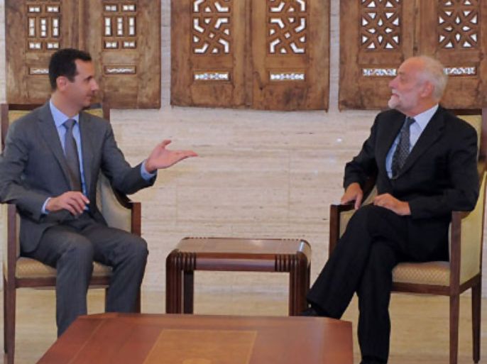 A photo released by the Syrian official news agency SANA shows Syrian President Bashar al-Assad (L) meeting with International Committee of the Red Cross (ICRC) chief Jakob Kellenberger in Damascus on September 05, 2011.