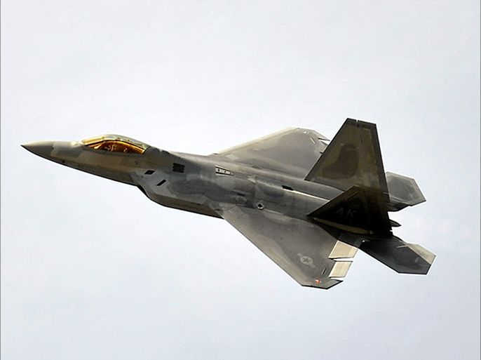 epa02253786 The U.S Air Force fighter plane F22 is pictured during a flying display at the Farnborough Airshow in Hampshire Britain, 19 July, 2010. The Farnborough Airshow opened 19 July. EPA/ANDY RAIN
