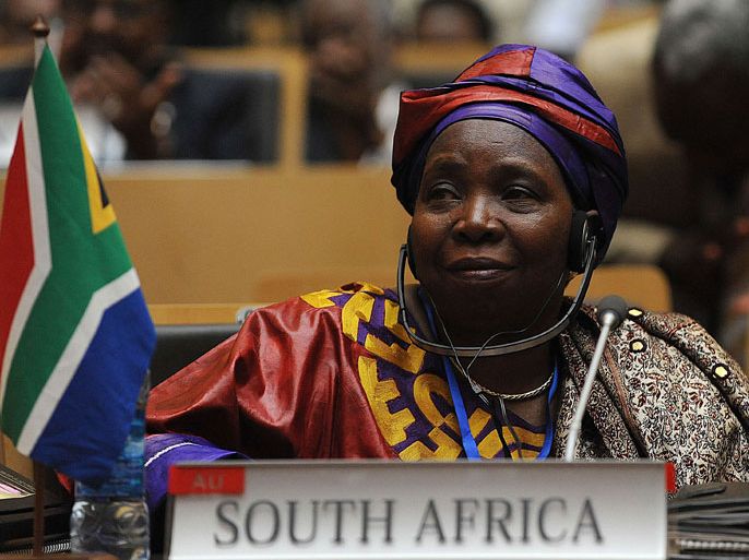 South African Home Affairs Minister Nkosazana Dlamini Zuma attends the African Union summit on July 15, 2012 in Addis Ababa. Dlamini-Zuma is challenging the sitting chairperson of the commission, Gabon's Jean Ping, after neither won the required two-thirds of the vote at the last summit six months ago, leaving Ping in the post. African leaders hold a summit to discuss the continent's hotspots and try to agree on a new head for the African Union's executive body after a deadlocked vote in January. AFP PHOTO/SIMON MAINA