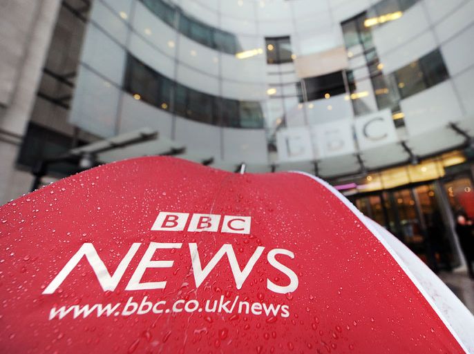 epa03514203 A rain soaked BBC umbrella outside the BBC headquarters in London, Britain, 19 December 2012. The BBC Trust announced findings of the Pollard Review into the corporation's handling of sexual abuse allegations against former employee Jimmy Savile, 19 December. EPA/ANDY RAIN