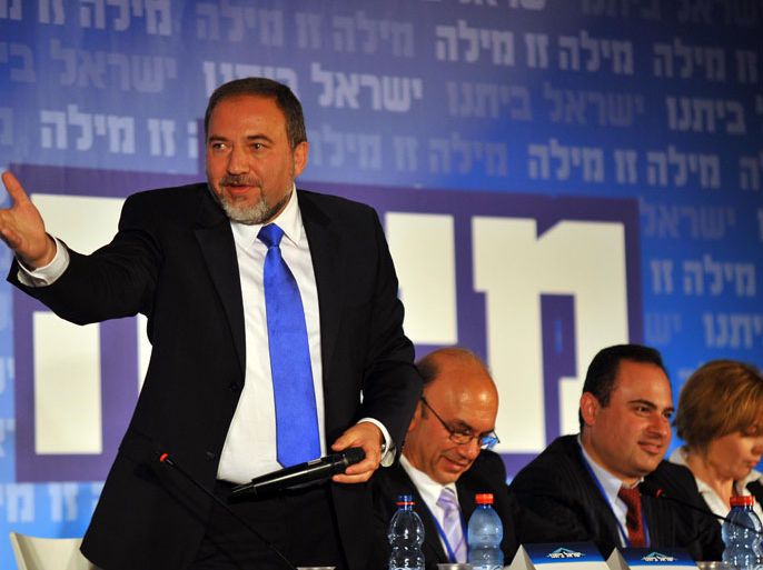 epa02686096 Israeli Foreign Minister Avigdor Liberman speaks to his party, Israel Beiteinue, at a conference in Jerusalem, on 13 April 2011. Israel's Attorney General Yehuda Weinstein said 13 April 2011 that he was considering indicting Foreign Minister Avigdor Lieberman for fraud, breach of trust, money-laundering and harassing a witness. However, an indictment will not be served until Attorney-General Yehuda Wienstein holds hearings, at which Lieberman's lawyers will be given a chance to defend their client, Israeli media reported. EPA/YOAV ARI DUDKEVITCH ISRAEL OUT