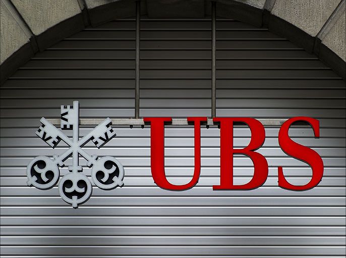 (FILES) This file photo taken on October 15, 2011 shows the logo of Swiss banking giant UBS at a branch in Zurich. French investigators have placed Swiss bank UBS under formal investigation on suspicion that it tried to persuade rich French clients to open undeclared accounts in Switzerland, a legal source said. AFP PHOTO / FABRICE COFFRINI