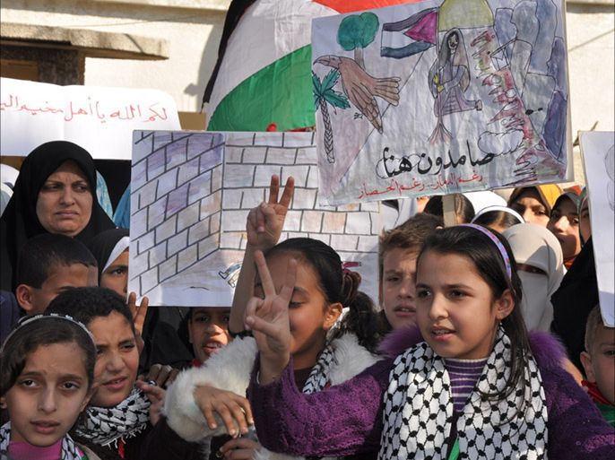 أطفال غزة خلال تضامنهم مع أقرانهم في اليرموك