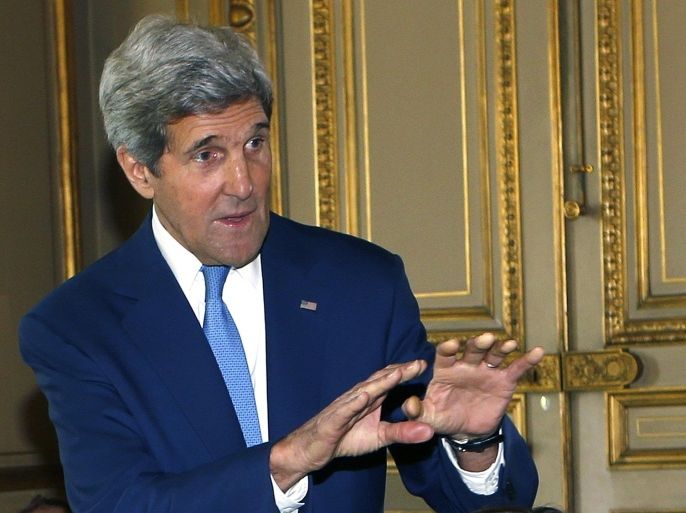 U.S. Secretary of State John Kerry gestures at the start of a Mideast crisis meeting at the Quai d'Orsay in Paris, July 26, 2014. REUTERS/Gonzalo Fuentes (FRANCE - Tags: POLITICS)