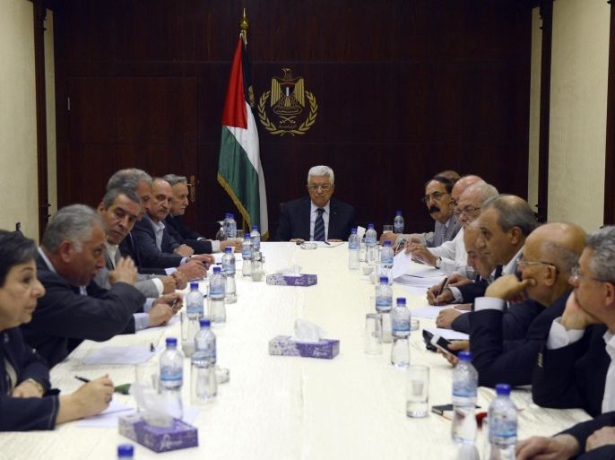 A handout photo released by the Palestine Authority of President Mahmoud Abbas chairing a meeting of the Political Committee of the Palestinian leadership in Ramallah 29 July 2014. Palestinian officials say 1,115 Palestinians, most of them civilians, have been killed in the fighting since 8 July EPA/thaer ghanaim