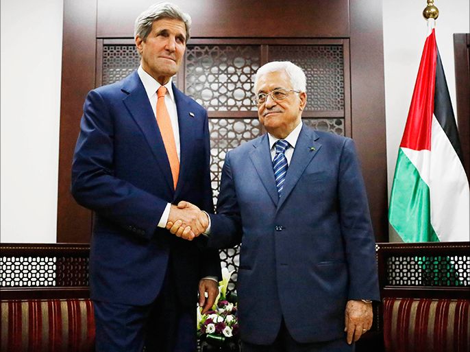 U.S. Secretary of State John Kerry (L) meets Palestinian Authority President Mahmoud Abbas in the West Bank city of Ramallah July 23, 2014. Israeli forces pounded Gaza on Wednesday, meeting stiff resistance from Hamas Islamists and sending thousands of residents fleeing, as U.S. Secretary of State John Kerry said on a visit to Israel ceasefire talks had made some progress. Israel launched its offensive on July 8 to halt missile salvoes by Hamas and its allies, struggling under the weight of an Israeli-Egyptian economic blockade and angered by a crackdown on their supporters in the nearby occupied West Bank. REUTERS/Charles Dharapak/Pool (WEST BANK - Tags: CIVIL UNREST POLITICS CONFLICT TPX IMAGES OF THE DAY)