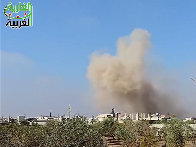 ‪‬ الطيران المروحي يلقي براميل متفجرة على بلدة الغارية الغربية بريف درعا(ناشطون)