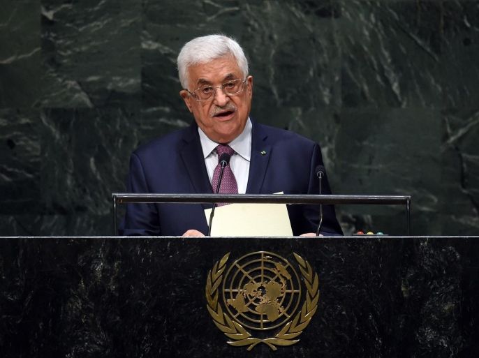 Palestinian president Mahmud Abbas addresses the 69th Session of the UN General Assembly September 26, 2014 in New York. Abbas accused Israel of waging 'war of genocide.' AFP PHOTO / Timothy A. CLARY