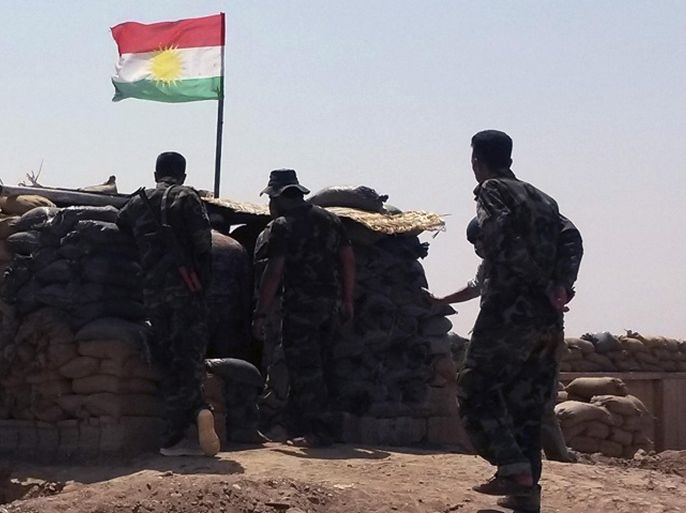 Members of Kurdish Peshmerga force stand guard at Sulaiman Pek front line, August 31, 2014. Iraqi security forces backed by Shi'ite militias on Sunday broke the two-month siege of Amerli by Islamic State militants and entered the northern town, officials said. The mayor of Amerli and army officers said troops backed by militias defeated fighters from the Islamic State (IS) to the east of the town. Fighting continued to the north of Amerli. REUTERS/ Stringer (IRAQ - Tags: CIVIL UNREST POLITICS MILITARY)
