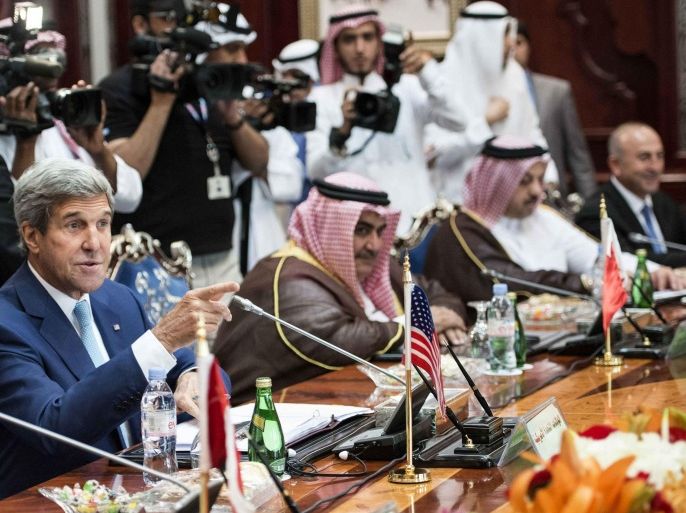 U.S. Secretary of State John Kerry talks with other attendees before the start of a Gulf Cooperation Council and Regional Partners meeting in Jeddah September 11, 2014. Kerry will press Arab leaders on Thursday to support President Barack Obama's plans for a new military campaign against Islamic State militants including help with greater overflight rights for U.S. warplanes. REUTERS/Brendan Smialowski/Pool (SAUDI ARABIA - Tags: POLITICS)