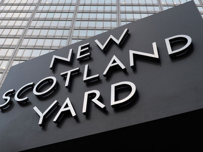 epa03986622 The sign outsdie New Scotland Yard in London, Britain, 11 December 2013.