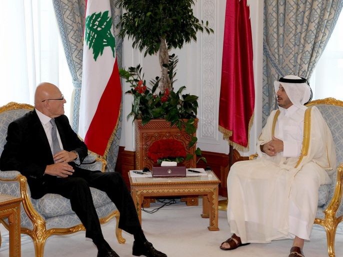 Qatari Emir Sheikh Tamim bin Hamad Al Thani (R) meets with Lebanese Prime Minister Tammam Salam (L) in Doha, Qatar, 14 September 2014. Media reports state Salam arrived in Doha on 14 Septembet for talks with Qatari officials about kidnapped Lebanese soldiers by fighters linked to the radical Sunni Islamic State (IS) and al-Nusra Front. Twenty-nine soldiers were abducted following clashes between Lebanese security forces and militants suspected of being part of JAN and IS that erupted on 02 August near the town of Arsal. EPA/DALATI NOHRA/HANDOUT