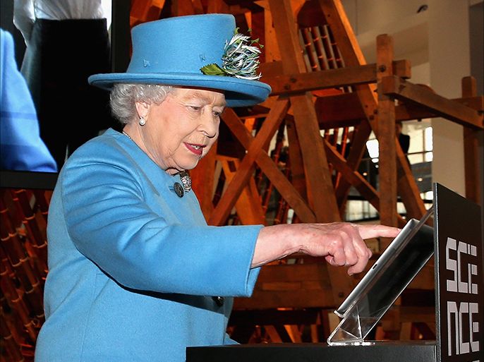 Britain's Queen Elizabeth II sends the first royal tweet under her own name to declare the opening of the new Information Age Galleries at the Science Museum, South Kensington, London, Britain, 24 October 2014. The Queen has passed a technological milestone, sending the first royal tweet under her own name to declare a new Science Museum gallery open. Normally a plaque is unveiled to herald the launch of a new project, but after touring the attraction dedicated to the history of communication and information the Queen touched a tablet screen to send her message to the world. EPA/CHRIS JACKSON / PA UK AND IRELAND OUT EDITORIAL USE ONLY EDITORIAL USE ONLY