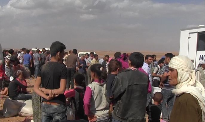 معاناة اللاجئين السوريين بالحدود السورية التركية