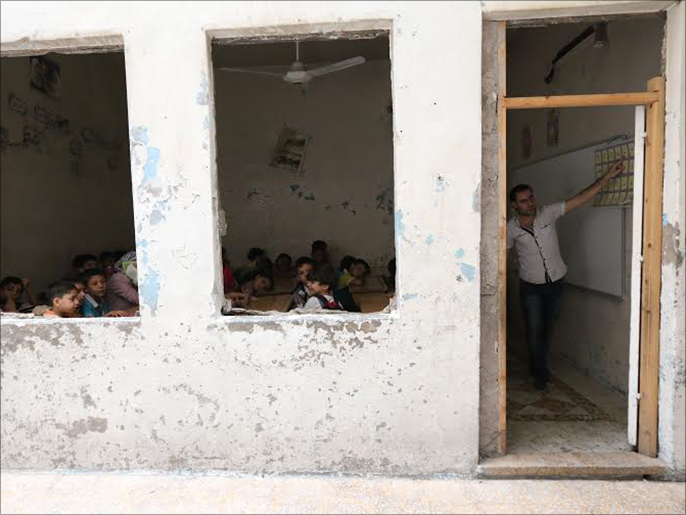 منزل جرى تحويله إلى مدرسة في حلب (الجزيرة)