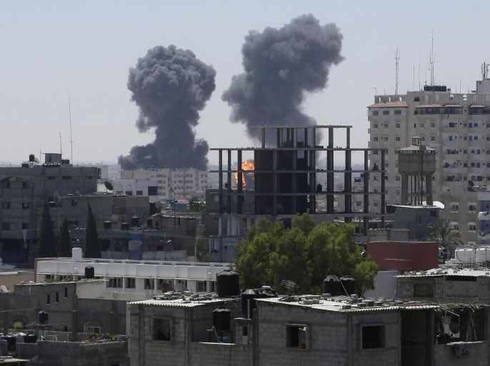 Smoke and flames are seen following what witnesses said were Israeli air strikes in Rafah in southern Gaza in this August 1, 2014 file photo. The July-August war in Gaza drew international condemnation for a number of reasons, but one episode proved more deadly than any other: an Israeli air and artillery bombardment on Aug. 1 that killed 150 people in a matter of hours.The events unfolded just as a three-day ceasefire was supposed to come into force. Hamas militants emerged from a tunnel inside Gaza and ambushed three Israeli soldiers, killing two of them and seizing the third.To rescue the soldier - dead or alive - and ensure Hamas could not use him as a hostage, the Israeli army invoked what is known as the "Hannibal directive", an order compelling units to do everything they can to recover an abducted comrade.What ensued was a furious assault on a confined area on the eastern edge of Rafah, the largest city in southern Gaza. To match Insight: MIDEAST-GAZA/WARCRIME REUTERS/Ibraheem Abu Mustafa/Files (GAZA - Tags: POLITICS CIVIL UNREST CONFLICT)