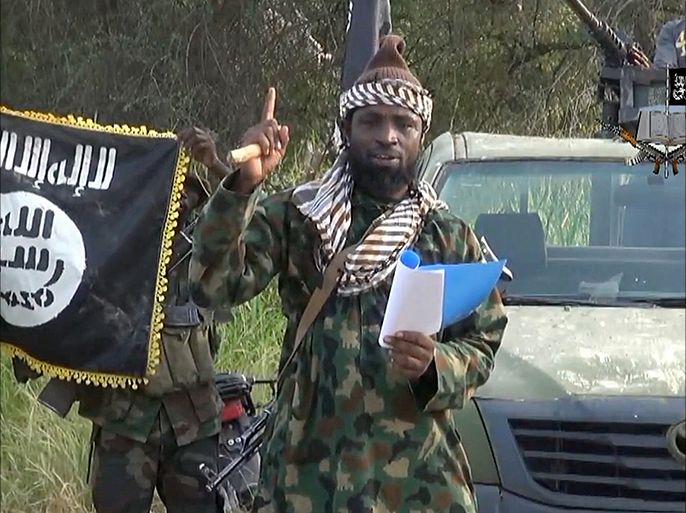 A screengrab taken on October 2, 2014 from a video released by the Nigerian Islamist extremist group Boko Haram and obtained by AFP shows the leader of the Nigerian Islamist extremist group Boko Haram, Abubakar Shekau delivering a speech. Shekau dismissed Nigerian military claims of his death in a new video obtained by AFP on October 2 and said the militants had implemented strict Islamic law in captured towns. AFP PHOTO / HO / BOKO HARAM