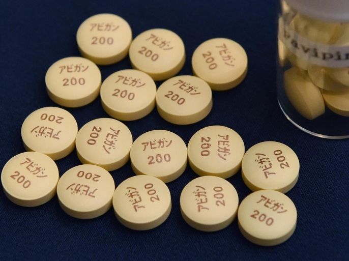 Anti-influenza Avigan Tablets produced by Japan's Fujifilm are displayed in Tokyo on October 22, 2014. Fujifilm said late on October 20 it would increase its stock of Avigan, which has been given to several patients who were evacuated from Ebola-hit West Africa to Europe. AFP PHOTO / KAZUHIRO NOGI