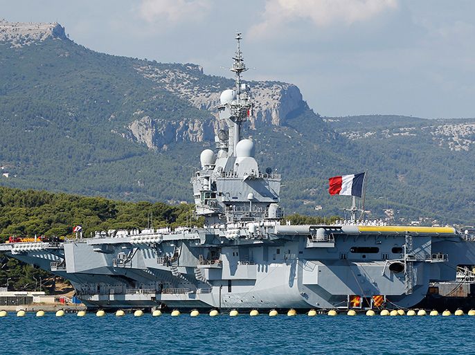 epa03848326 The French nuclear aircraft carrier Charles De Gaulle is seen moored in the Toulon military harbor, France, 02 September 2013. Syrian President Bashar al-Assad has warned France against taking part in any military action against his regime, warning: 'There will be repercussions, negative of course, for French interests.' Assad made the remarks in an interview with France's Le Figaro daily. EPA/SEBASTIEN NOGIER