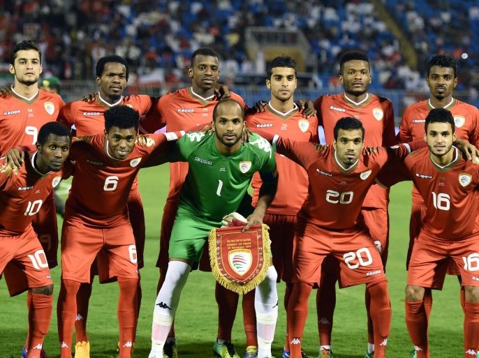 Oman's team pose for a team photo prior to their Group B Gulf Cup football match against Kuwait at the Prince Faisal bin Fahad stadium in Riyadh on November 20, 2014. Oman won the match 5-0. AFP PHOTO/ FAYEZ NURELDINE