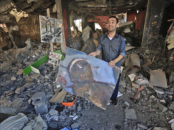 لوحة لطفل جريح أصيبت بشظايا الصواريخ الإسرائيلية