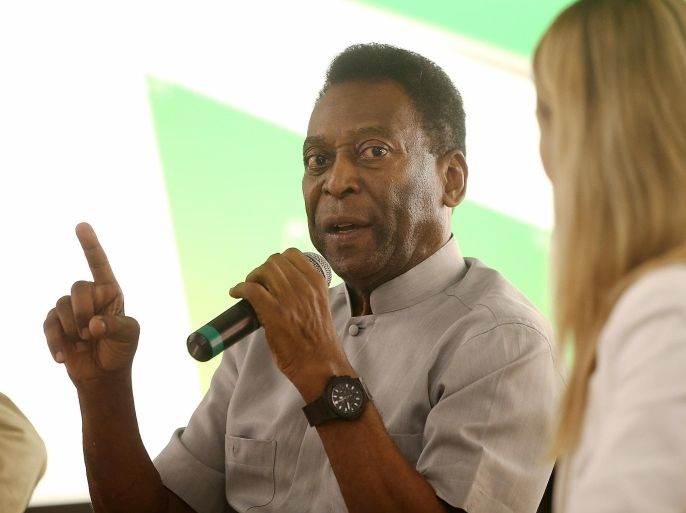 RIO DE JANEIRO, BRAZIL - MAY 15: Brazilian soccer legend Pele speaks to customers in the Apple store on May 15, 2014 in Rio de Janeiro, Brazil. Pele and film director Anibal Neto spoke with customers about 'Pele Eterno', a documentary about Pele's life. The 2014 FIFA World Cup kicks off on June 12.