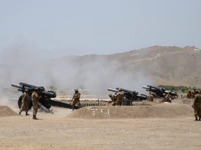 A handout picture released by the Pakistan Armed Forces Inter-Services Public Relations (ISPR) made available on 03 July 2014 shows Pakistani soldiers using weaponry during a military operation against Taliban militants in the town of Miranshah in North Waziristan. Pakistan's military boosted their ground operations against militant strongholds 30 June after more than two weeks of aerial bombardment and civilian evacuations, an official said. Troops moved into Miranshah in the tribal district of North Waziristan for house-to-house searches, army spokesman Major General Asim Saleem Bjawa said. Over 370 militants are estimated to have been killed and 19 have surrendered since the June 15 start of the operation, dubbed Zarb-e-Azb after a sword wielded by Prophet Mohammed. At least 61 militant hideouts have been destroyed, the spokesman said.