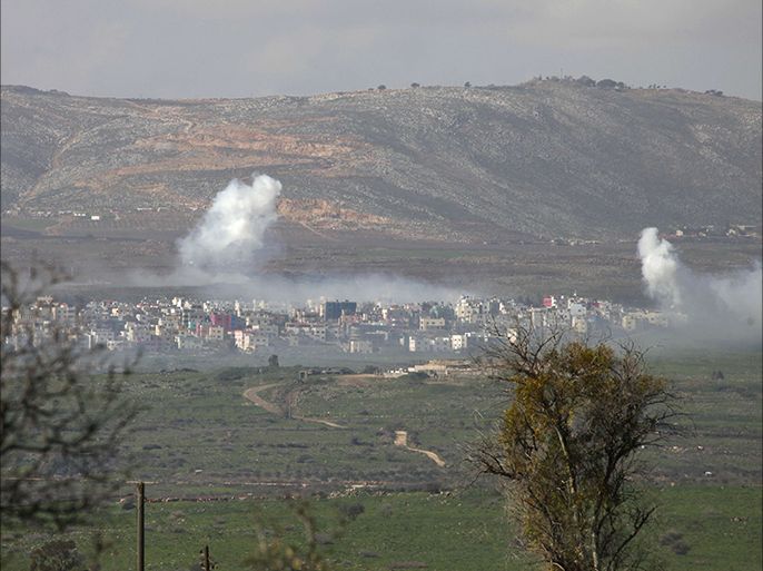 A picture taken from the town of Ghajar on the Israeli side shows smoke from Israeli shelling covers the Lebanese town of Al-Majidiyah on the Lebanese border with Israel on January 28, 2015. Lebanese Shiite militant group Hezbollah claimed responsibility on Wednesday for an attack against a military convoy in an Israeli-occupied border area on January 28, 2015. At least four Israelis were wounded, sparking a cross-border firefight. AFP