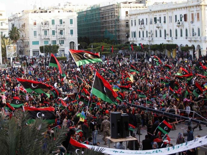 Libyans celebrate the fourth anniversary of the revolution against Muammar Gaddafi at Martyrs' Square in Tripoli, February 17, 2015. REUTERS/Ismail Zitouny (LIBYA - Tags: POLITICS CIVIL UNREST ANNIVERSARY)