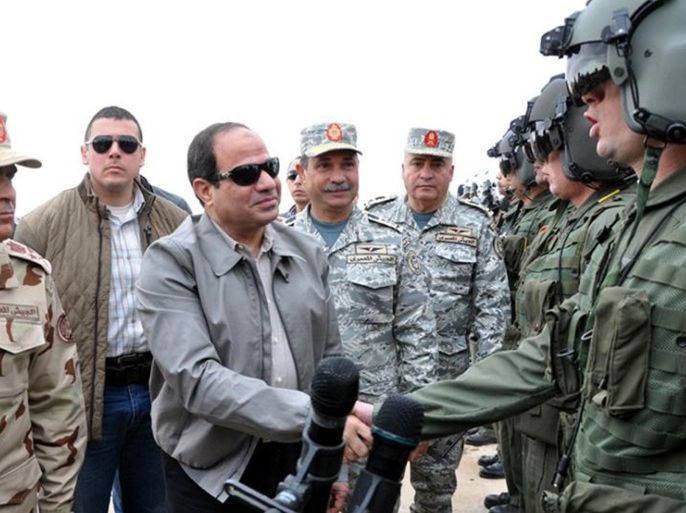 MARSA MATRUH, EGYPT - FEBRUARY 18: Egyptian President Abdel Fattah el-Sisi visits pilots working at military base in Marsa Matruh district of Egypt near the border with Libya on February 18, 2015.