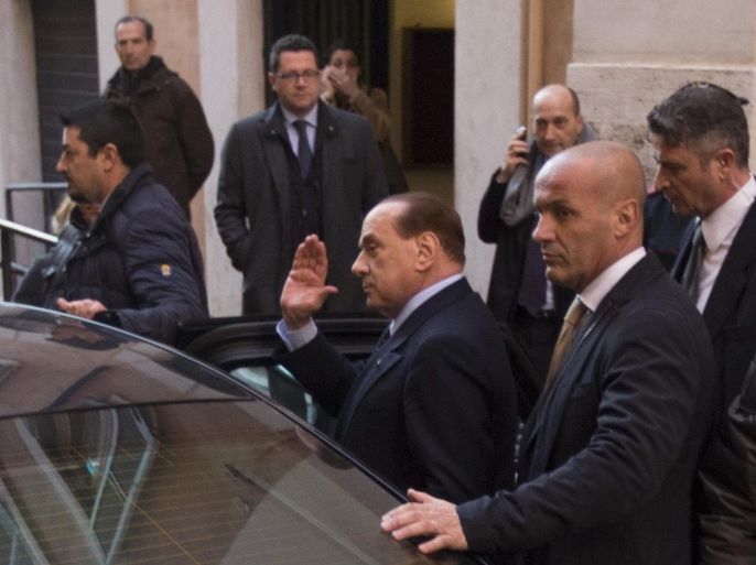 Former Italian premier and Forza Italia (FI) party leader Silvio Berlusconi (C) boards a car after a meeting with FI parliamentarians in Rome, Italy, 11 February 2015. Silvio Berlusconi told lawmakers for his centre-right Forza Italia (FI) party on Wednesday that it was the fault of Premier Matteo Renzi's Democratic Party (PD) that the so-called Nazareno pact for institutional reforms broke down. He also vowed to conduct total opposition to Renzi's government from now on.