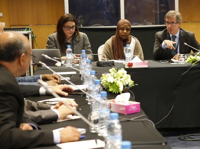 UN Special Envoy to Libya Bernardino Leon, right, speaks with delegates of government in the eastern city of Tobruk, at the Palais des Congres of Skhirate 30 km south of Rabat, Morocco, Thursday, March 5, 2015. Following the opening of the talks, the UN Special Envoy to Libya Bernardino Leon expressed his confidence that the two sides felt a degree of urgency to reach an agreement amid the deteriorating situation in the country. (AP Photo/Abdeljalil Bounhar)
