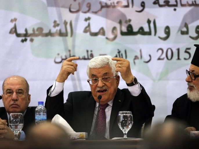 Palestinian leader Mahmud Abbas (C) addresses the Palestinian leadership at the opening of a two-day conference in the West Bank city of Ramallah to discuss the future of the Palestinian Authority, on March 4, 2015. Abbas said talks with Israel are still on the table, despite moves against the Jewish state at the UN and numerous failed rounds of negotiations. AFP PHOTO / ABBAS MOMANI