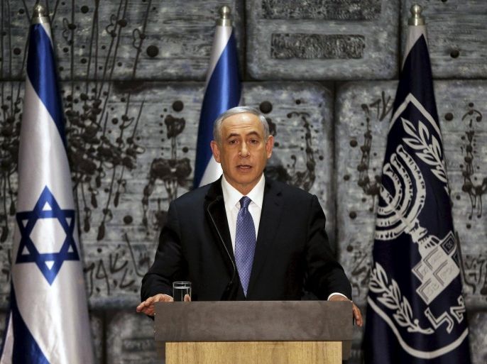 Israeli Prime Minister Benjamin Netanyahu speaks during a ceremony at President Reuven Rivlin's residence in Jerusalem March 25, 2015. Netanyahu, grappling with fierce White House disapproval, won consent from Israel's president on Wednesday to try to form a new coalition government. REUTERS/Ammar Awad