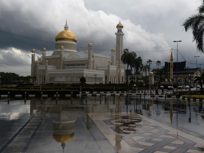 The Sultan Omar Ali Saifuddin Mosque is reflected in the pavement after heaving rains hit Bandar Seri Begawan on April 23, 2013 a day before a meeting by leaders from the Association of Southeast Asian Nations (ASEAN). Leaders of the Association of Southeast Asian Nations (ASEAN), who will meet in Brunei on April 24-25, are expected to focus on kickstarting the talks after launching the process last year at a regional summit in Phnom Penh.