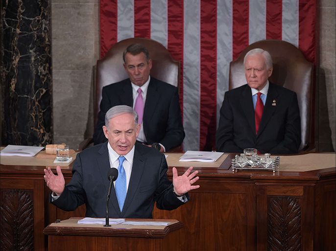 Israel's Prime Minister Benjamin Netanyahu addresses a joint session of the US Congress on March 3, 2015 at the US Capitol in Washington, DC. Netanyahu was invited by House Speaker John Boehner to address Congress without informing the White House. Looking on are House Speaker John Boehner(L) and President pro tempore of the Senate Sen. Orrin Hatch. AFP