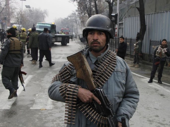 Afghan police secure the scene of a suicide bomb in Kabul, Afghanistan, 26 February 2015. A suicide bomber targeted a Turkish embassy vehicle with an explosives-laden car on 26 February near the Iranian embassy in a diplomatic area of Kabul city, police said. One person was injured in the incident according to reports.
