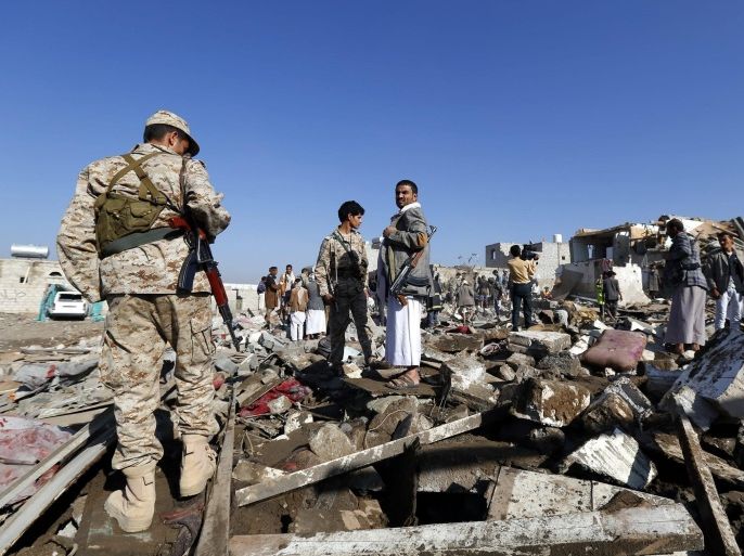 Armed members of Houthi militia gather over the rubble of houses that were allegedly destroyed by a Saudi air strike, in Sana'a, Yemen 26 March 2015. Saudi Arabia and other Gulf states launched air strikes against Houthi rebels which have taken over large parts of Yemen, attacking the Sana'a military Airport and Jiraf area, a Houthi stronghold. The strikes were 'in support of the people of Yemen and their legitimate government,' Saudi Arabia's Washington ambassador Adel al-Jubeir said. The military operation by a 'coalition of over 10 countries' was in response to an appeal from embattled Yemeni President Abdo Rabbo Mansour Hadi, al-Jubeir said.