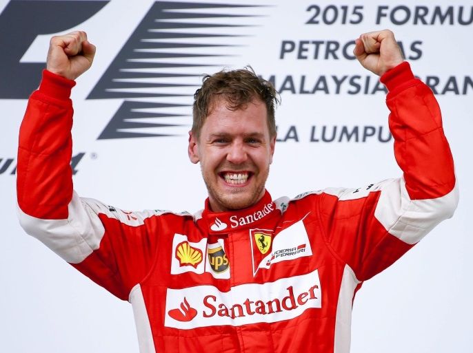 German Formula One driver Sebastian Vettel of Scuderia Ferrari celebrates after winning the 2015 Formula One Grand Prix of Malaysia at the Sepang Circuit in Sepang, Malaysia, 29 March 2015.