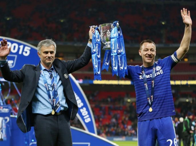 Football - Chelsea v Tottenham Hotspur - Capital One Cup Final - Wembley Stadium - 1/3/15 Chelsea manager Jose Mourinho and John Terry pose with the Capital One Cup Action Images via Reuters / Matthew Childs Livepic EDITORIAL USE ONLY. No use with unauthorized audio, video, data, fixture lists, club/league logos or "live" services. Online in-match use limited to 45 images, no video emulation. No use in betting, games or single club/league/player publications. Please contact your account representative for further details.