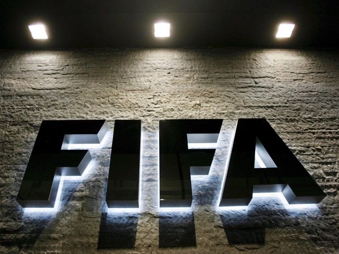 (FILE) A file picture dated 29 October 2007 of the FIFA logo at the FIFA headquaters in Zurich, Switzerland. The FIFA 2022 World Cup in Qatar should be held in November and December, a FIFA task force has recommended on 24 February 2015. EPA/STEFFEN SCHMIDT *** Local Caption *** 51661149