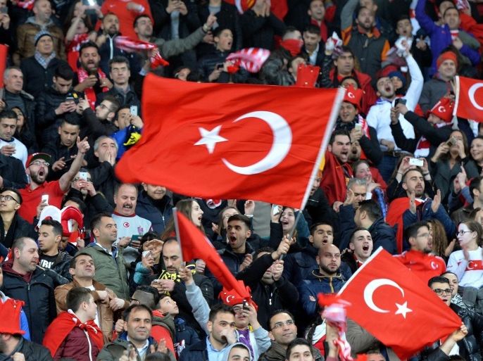 AMSTERDAM, NETHERLANDS - MARCH 28: Fans of Turkish National football team show their support during the Euro 2016 qualifying round football match between Netherlands and Turkey at the Arena Stadium, on March 28, 2015 in Amsterdam.