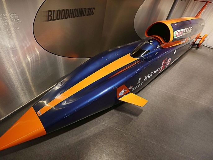 A handout photograph made available by the British Ministry of Defence showing the unveiling of a new exhibit of the Bloodhound Super Sonic Car (SSC) at the Coventry Transport Museum, Coventry, central England, 18 February 2015. British Royal Air Force (RAF), Wing Commander Andy Green, the driver of Bloodhound Super Sonic Car (SSC), opened the exhibit which has a full sized replica of the car he will be driving to make his attempt on the World land speed record, on Hackskeen Pan, Northern Cape, South Africa. Bloodhound SSC which will hopefully reach 1000 mph in 2016. Also on show are Thrust SSC and Thrust 2, vehicles both of which have held the land speed record. Along with this visitors can see the suits worn by the drivers of the various record breaking cars. A small team of four RAF experts from 71 Inspection and Repair (IR) Squadron will spend the next few months building the hardest working tail fin in history on the Bloodhound jet and rocket powered car, designed to remain perfectly straight despite being exposed to the most extreme forces on the planet. EPA/SAC LEE MATTHEWS RAF / BRITISH MINISTRY OF DEFENCE / HANDOUT