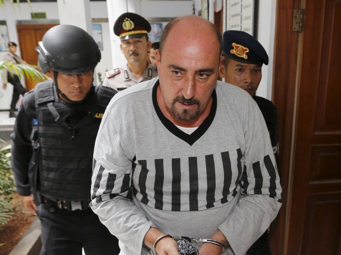 Death row inmate Serge Atlaoui of France arrives for signing documents for his judicial review at Tangerang District Court in Tangerang, Banten province April 1, 2015. The planned executions by Indonesia of death row inmates, most convicted on drug smuggling charges, have been condemned internationally. The group includes citizens of Australia, France, Brazil, the Philippines, Ghana, and Nigeria, as well as Indonesia. REUTERS/Beawiharta