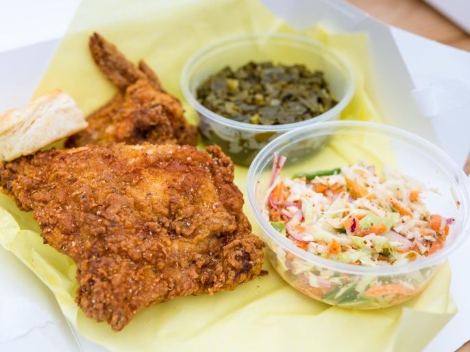 Close up of fast food fried chicken, coleslaw and green beans