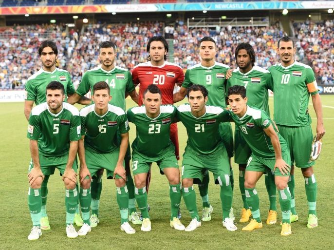 The Iraqi team poses for a group photo before the third-place play-off football match between Iraq and United Arab Emirates at the AFC Asian Cup in Newcastle on January 30, 2015. AFP PHOTO / Saeed Khan --IMAGE RESTRICTED TO EDITORIAL USE - STRICTLY NO COMMERCIAL USE