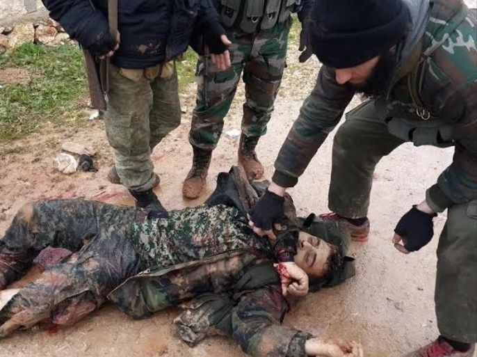 أحد قتلى المرتزقة الأفغان المقاتلين إلى جانب قوات النظام