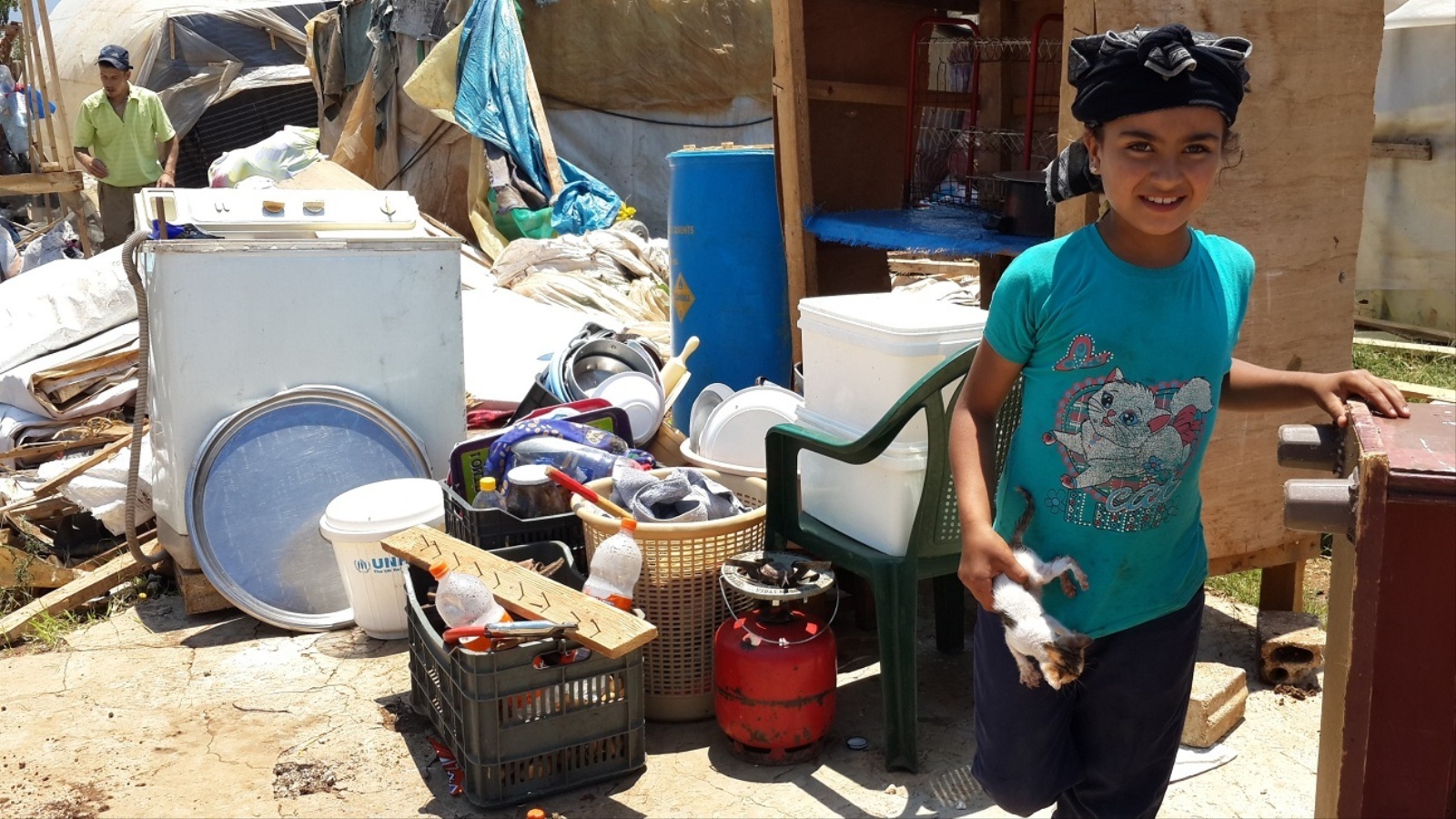 ‪براءة الأطفال تتحدى واقع اليأس والبؤس في مخيمات اللاجئين‬ (الجزيرة نت)